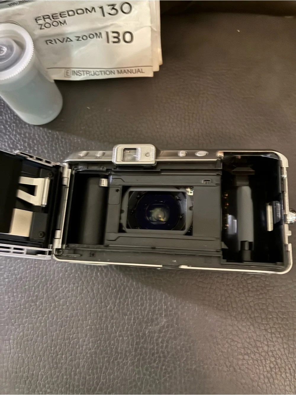 Minolta Freedom 130 Zoom 35mm Film Camera w/Carrying Case, Manual, & Film Roll